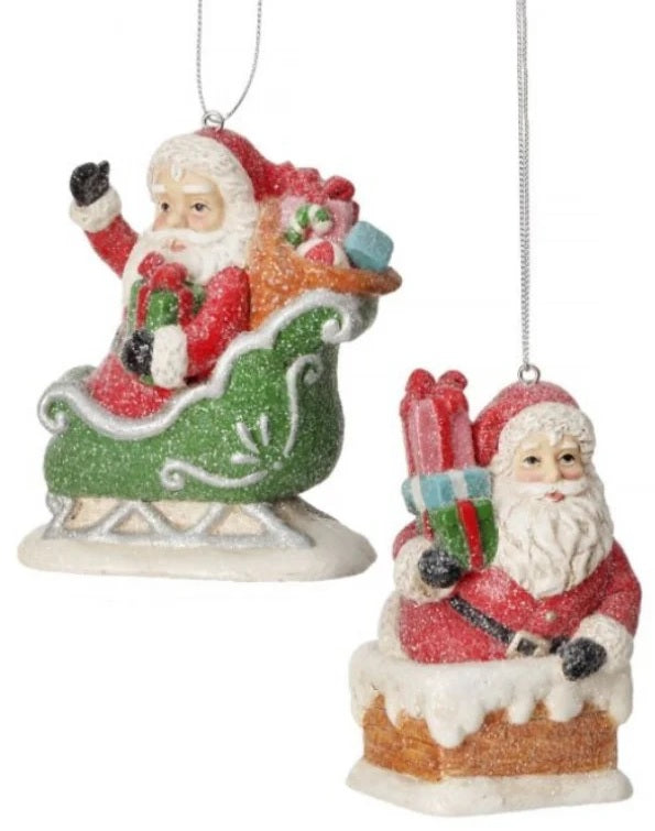 Santa Claus figurine Christmas Ornament. One ornament features Santa in a sleigh. One ornament features Santa in a chimney.