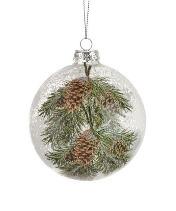 Glass ornament featuring pine cones and pine needles. Each ornament is decorated to appear covered in frost. One is finial-shaped and the other is bauble-shaped.