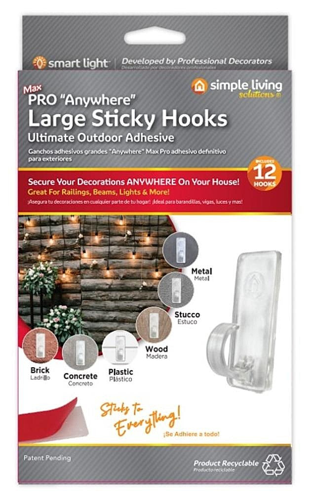 This image shows the packaging that these hooks come in. It reads "MAX Pro Anywhere Large Sticky Hooks Ultimate Outdoor Adhesive. Secure your decorations ANYWHERE on your house! Comes with 12 hooks. Great for railings, beams, lights and more! Sticks to metal, stucco, wood, plastic, concrete and brick. Sticks to everything!"