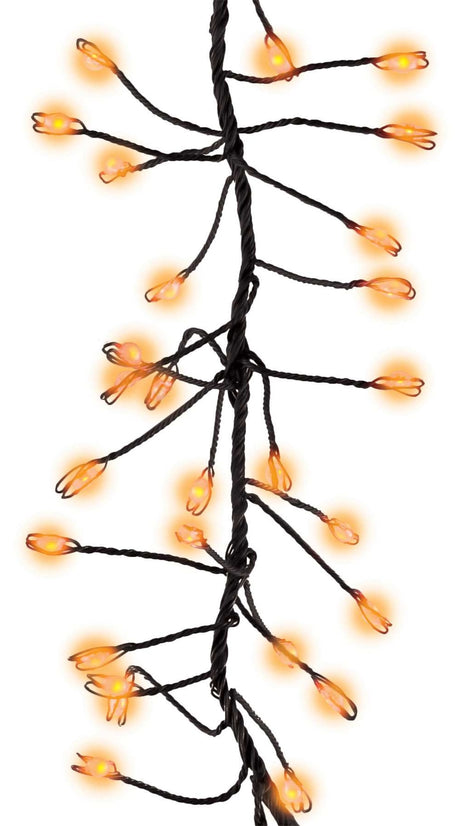 This image shows an up close view of the orange big seed cluster light string.