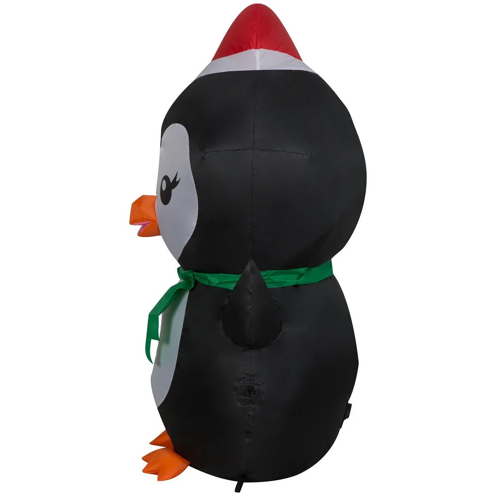 Christmas inflatable designed to look like a cute penguin wearing a Santa hat and a green scarf.