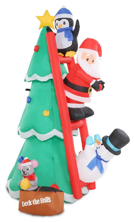 Christmas inflatable shaped like a penguin, Santa and a snowman climbing a red ladder leaning up against a Christmas tree. They're putting the finishing touches on the tree decorating. There's a little box at the bottom with a mouse holding an ornament. The box reads "DECK THE HALLS."
