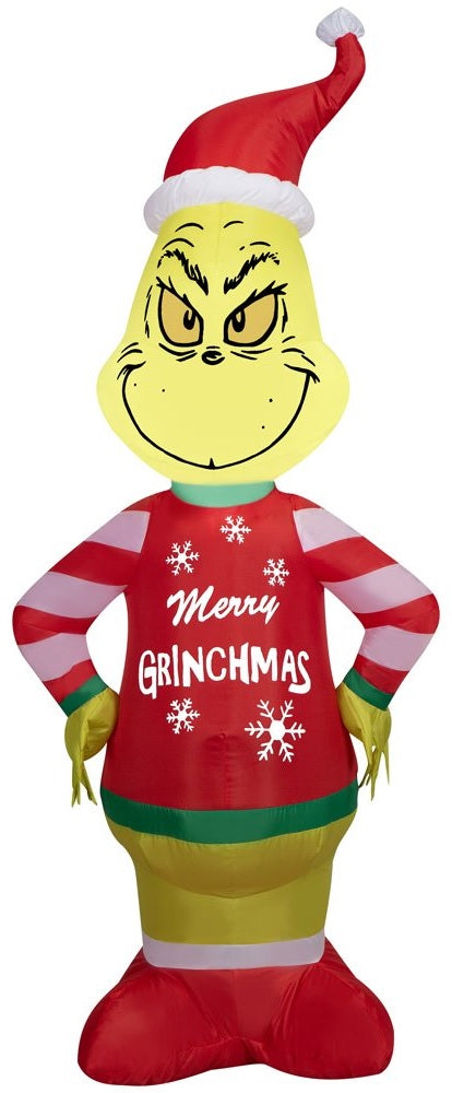 Christmas inflatable shaped like the cartoon character The Grinch. The Grinch is wearing a Santa hat and an "ugly" sweater that reads "Merry Grinchmas." The sleeves on the sweater are red and white striped.
