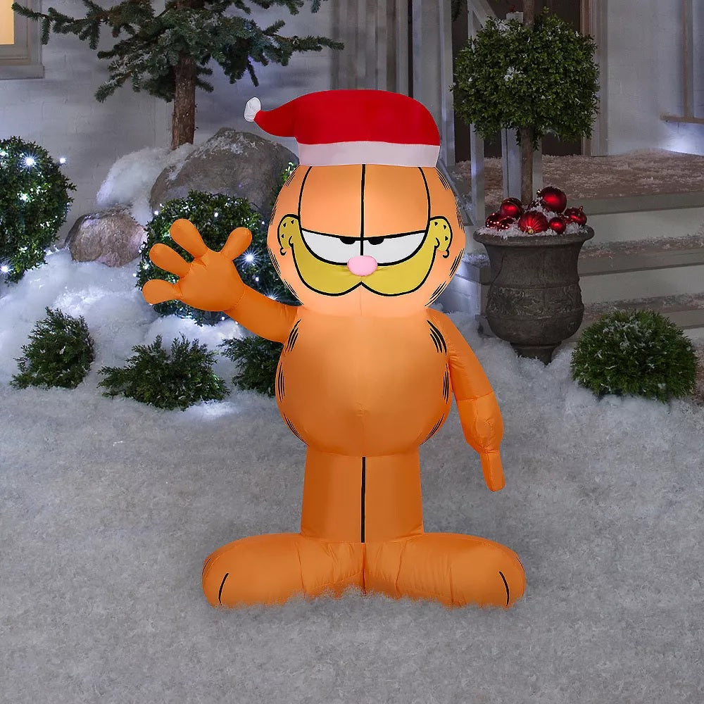 Christmas inflatable designed to look like the cartoon character Garfield wearing a Santa hat.