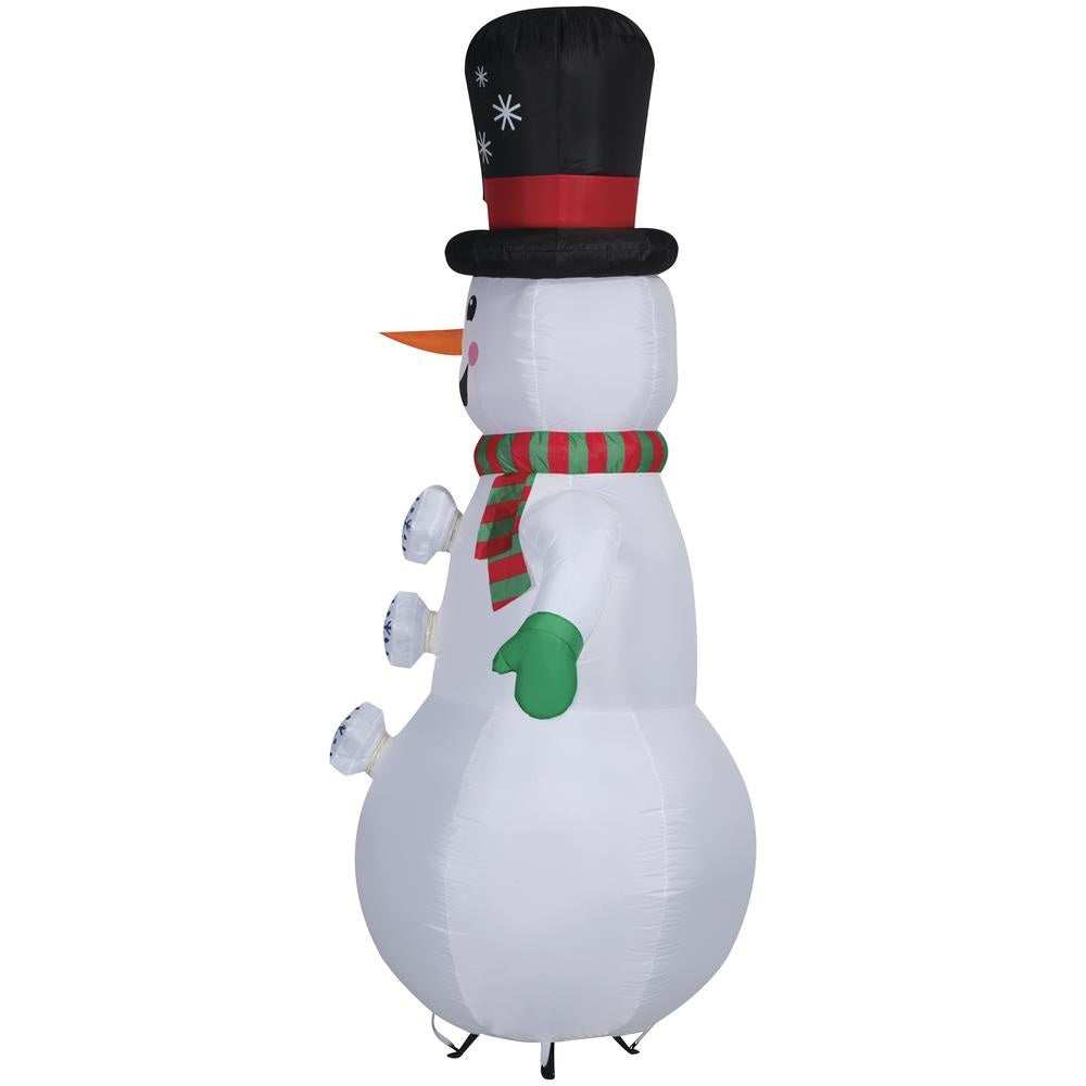 Inflatable snowman wearing a top hat, a red and green striped scarf and green gloves. There are buttons shaped like snowflakes going down his belly. The buttons spin!