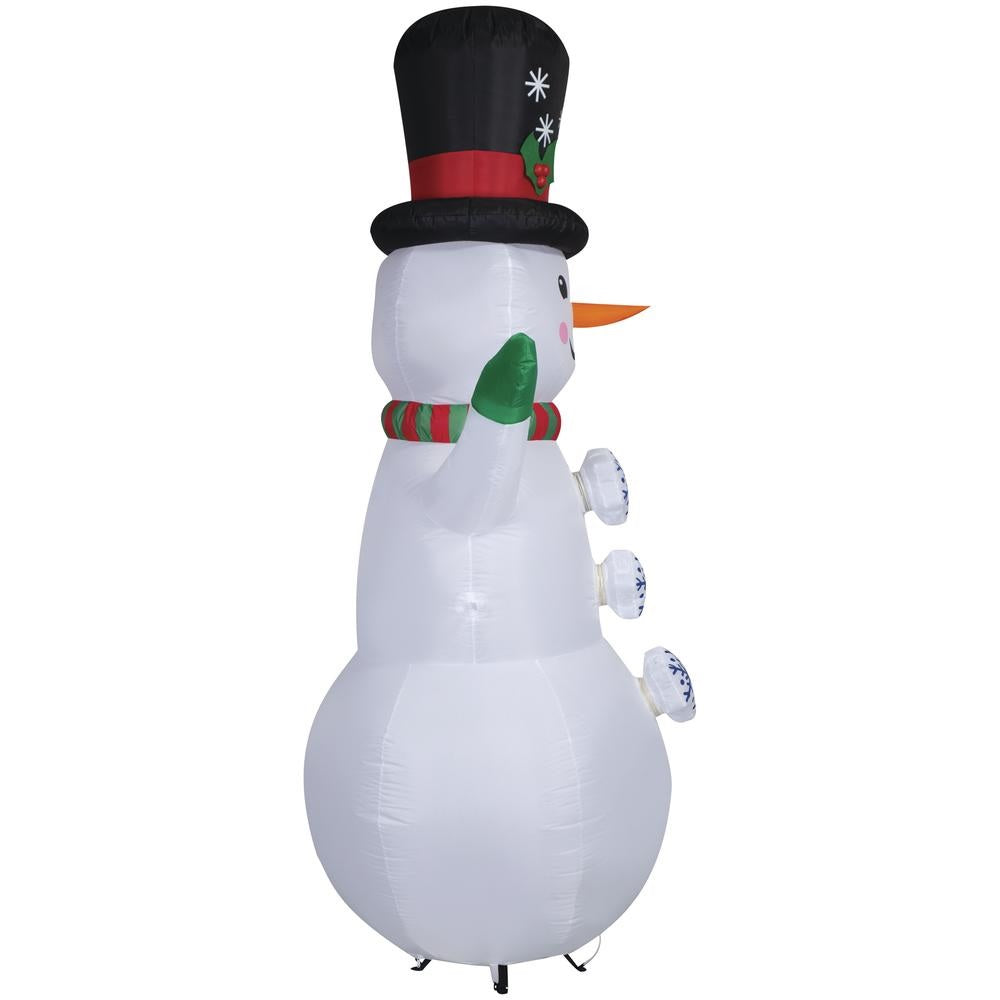 Inflatable snowman wearing a top hat, a red and green striped scarf and green gloves. There are buttons shaped like snowflakes going down his belly. The buttons spin!