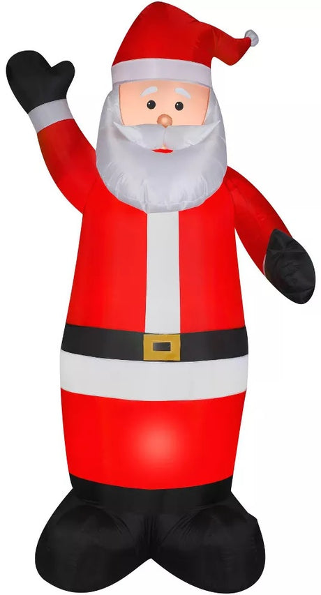 Christmas inflatable shaped like Santa Claus, wearing his traditional red suit and hat. Santa is waving.