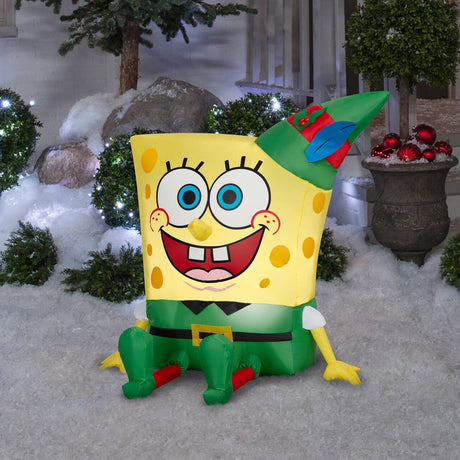 Christmas inflatable shaped like the cartoon character SpongeBob SquarePants dressed as an elf for Christmas.