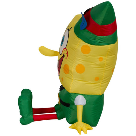 Christmas inflatable shaped like the cartoon character SpongeBob SquarePants dressed as an elf for Christmas.