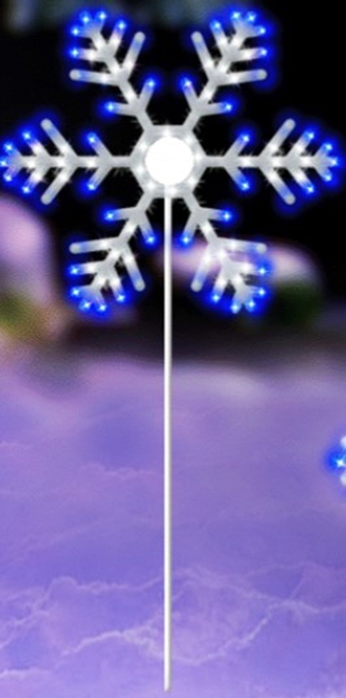 Lighted decoration shaped like a snowflake with twinkling pure white and blue lights.