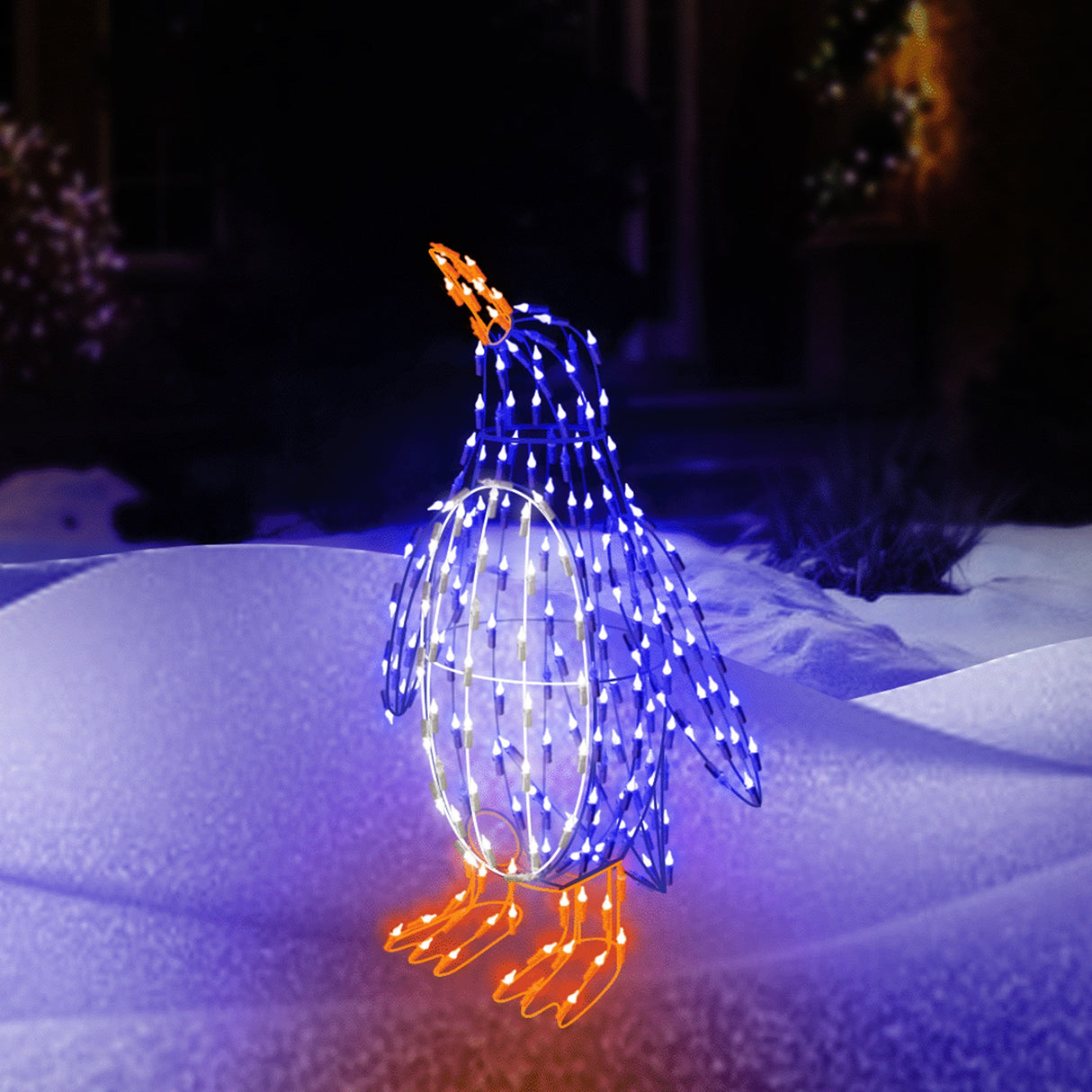Outdoor LED wire sculpture shaped like a standing penguin. Pre-lit with blue, pure white and orange lights.