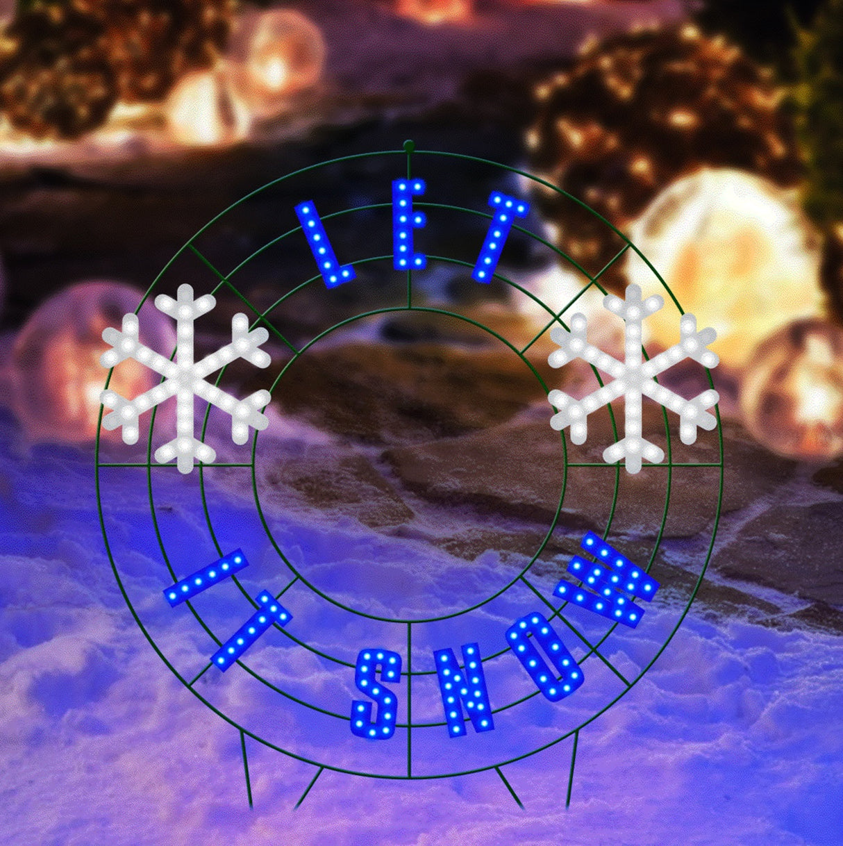 Outdoor LED decoration that reads "Let it Snow." The text is blue. There are two pure white snowflakes.