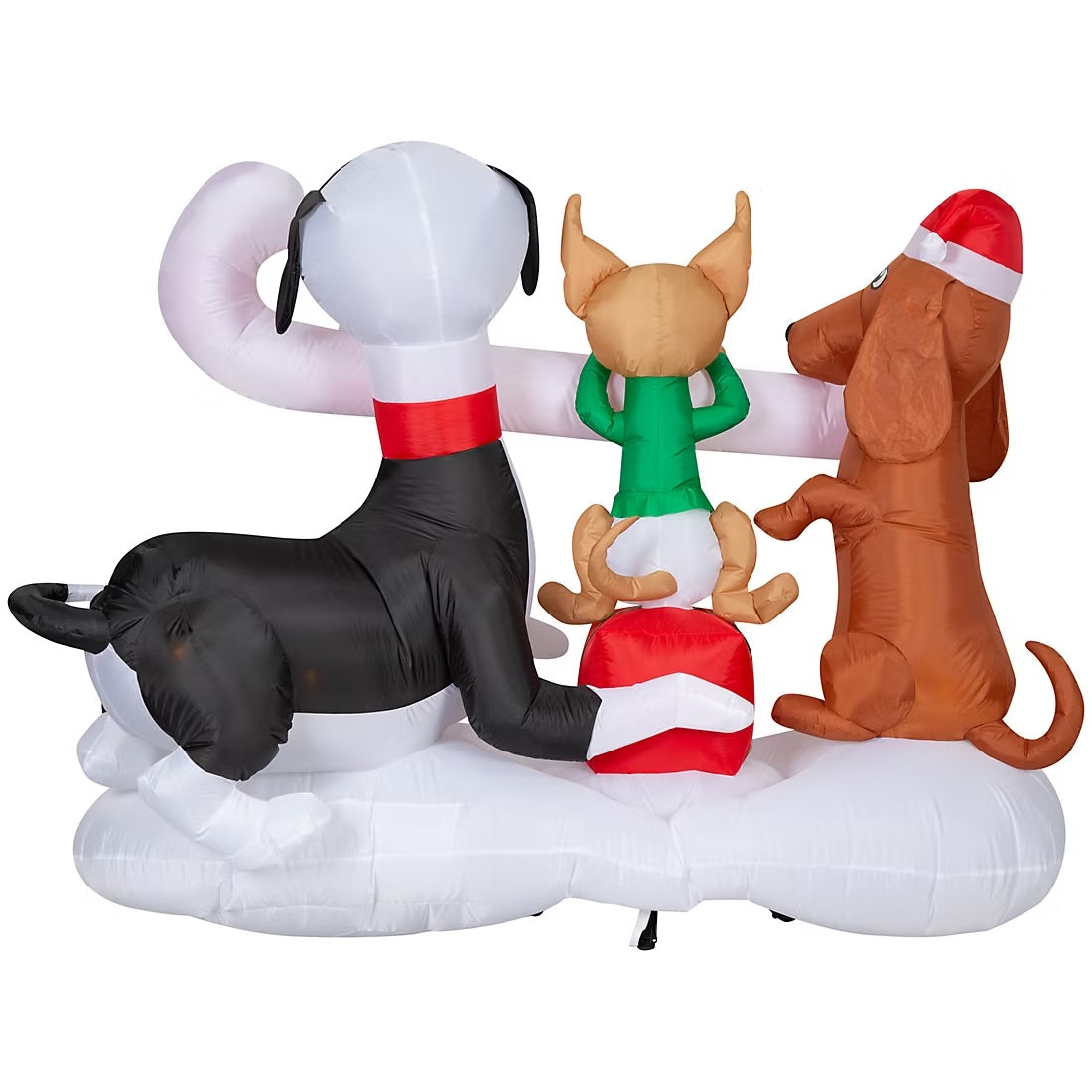 Christmas inflatable designed to look like three dogs sharing a giant candy cane. One dog is wearing a Santa hat, another one is sitting on a present and the third is wearing a red scarf.