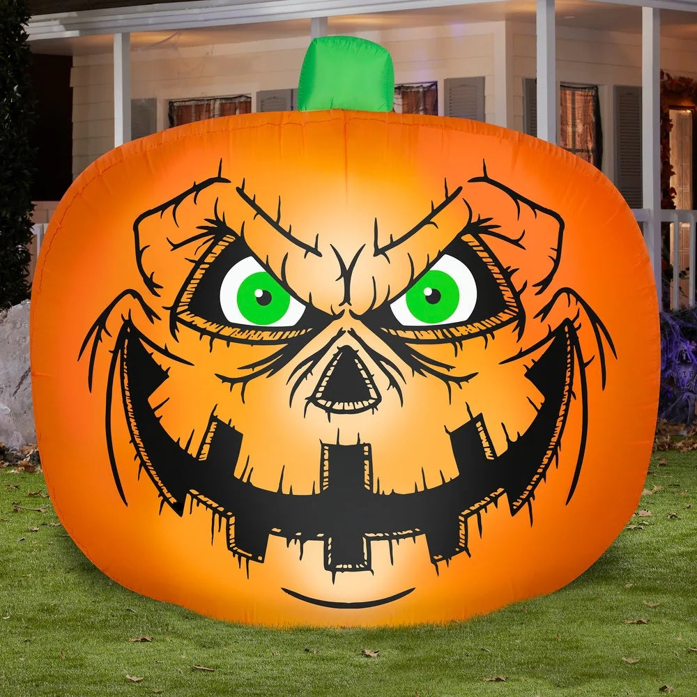 Outdoor Halloween inflatable. Designed to look like a spooky jack-o-lantern with bright green eyes.