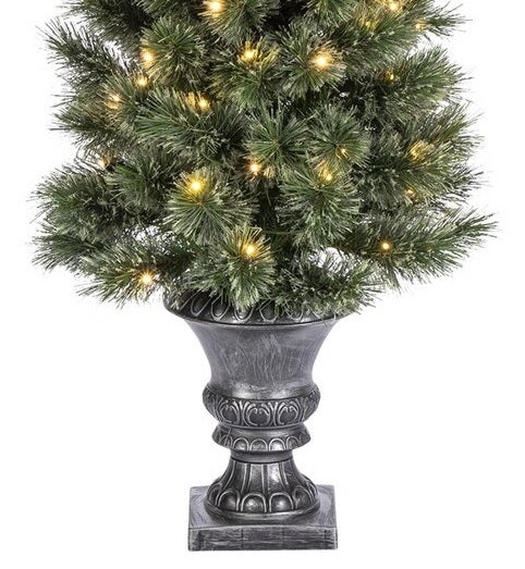 Four foot artificial pine tree in a distressed silver/gray pot.