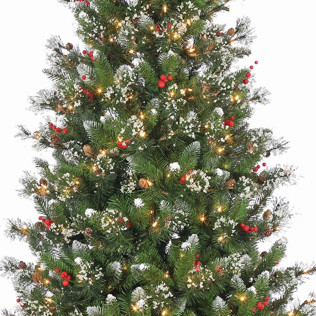 7.5 ft. artificial tree accented with faux snow, red berries and pine cones and pre-lit with dual lights.