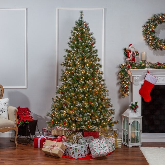 7.5 ft. artificial tree accented with faux snow, red berries and pine cones and pre-lit with dual lights.