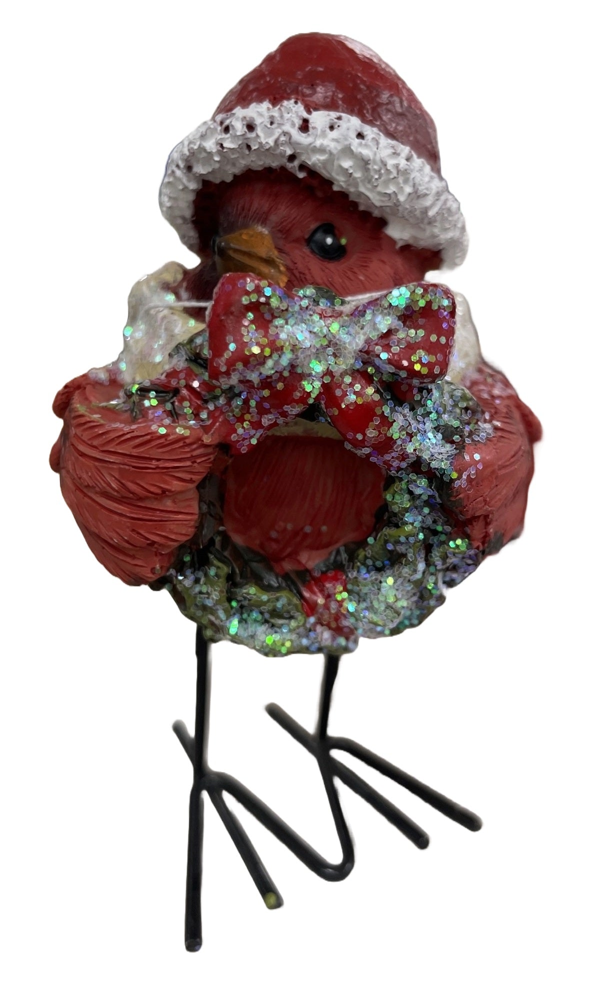 Standing red cardinal decoration for Christmas. One cardinal is wearing a white scarf and holding a wreath. One cardinal is wearing a green scarf and holding a string of lights. One cardinal is wearing a blue scarf and holding a small tree.
