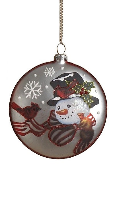 Round ornament featuring a snowman in a winter scene. One ornament has a snowman wearing a red and white scarf and a top hat and is smiling at a squirrel and two cardinals. One ornament has a snowman wearing a red and gold scarf and a top hat and is smiling at a bird on a branch. One ornament has a snowman wearing a red, green and gold scarf and a Santa hat. Each ornament features holly leaves and berries and snowflakes.