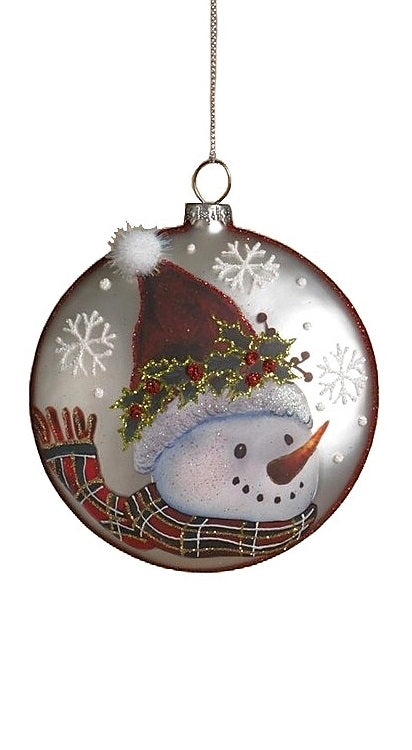 Round ornament featuring a snowman in a winter scene. One ornament has a snowman wearing a red and white scarf and a top hat and is smiling at a squirrel and two cardinals. One ornament has a snowman wearing a red and gold scarf and a top hat and is smiling at a bird on a branch. One ornament has a snowman wearing a red, green and gold scarf and a Santa hat. Each ornament features holly leaves and berries and snowflakes.