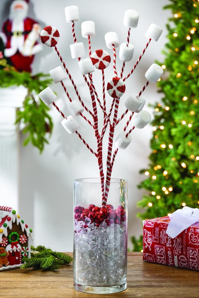 Pick spray designed to look like red and white striped branches with marshmallows and peppermint candies.