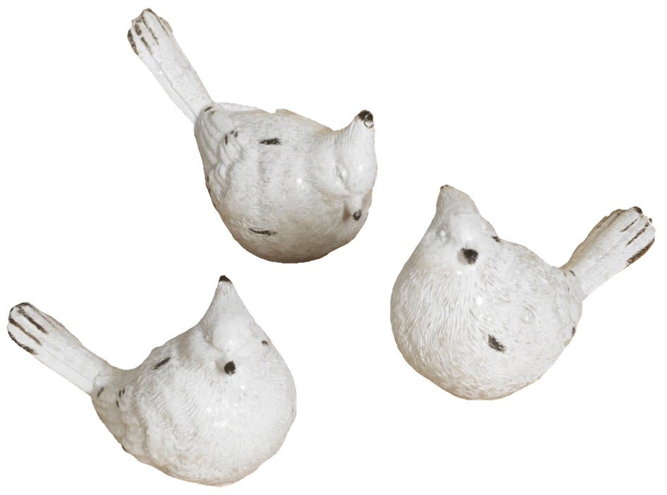 White resin bird figurine. This picture shows all three options available.