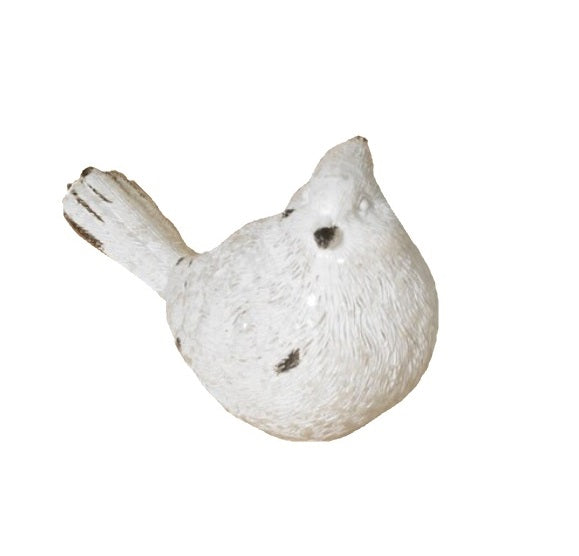White resin bird figurine.