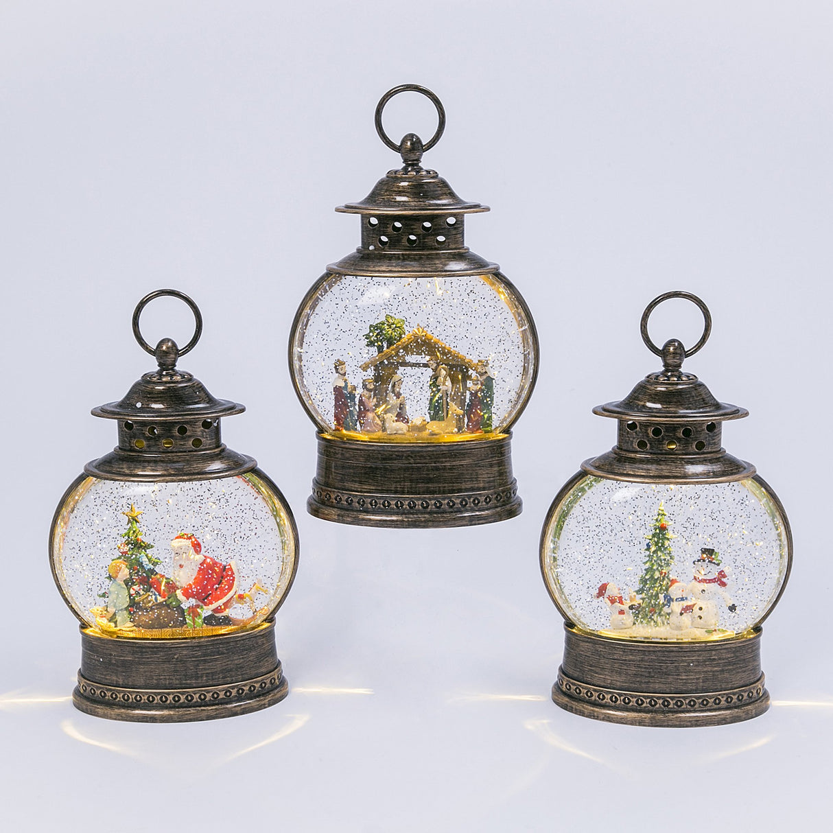 Glass globe lantern tabletop decoration. This picture shows the three options available.