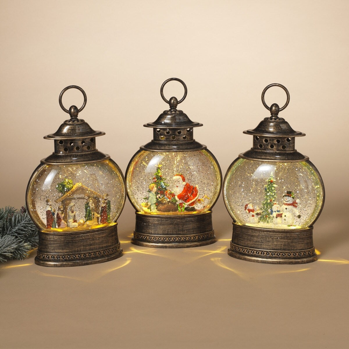 Glass globe lantern tabletop decoration. This picture shows the three options available.