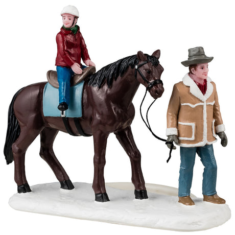 Resin figurine for a Lemax display. Designed to look like a man holding the reins of a brown horse. There's a young child riding the horse and wearing a helmet. They're both wearing winter clothes.