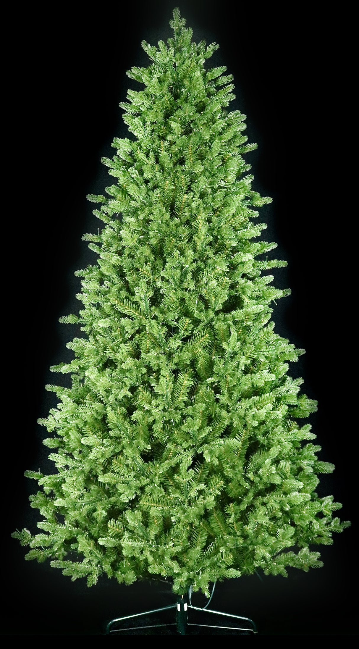 Artificial Christmas tree with color-changing, starry LED lights.