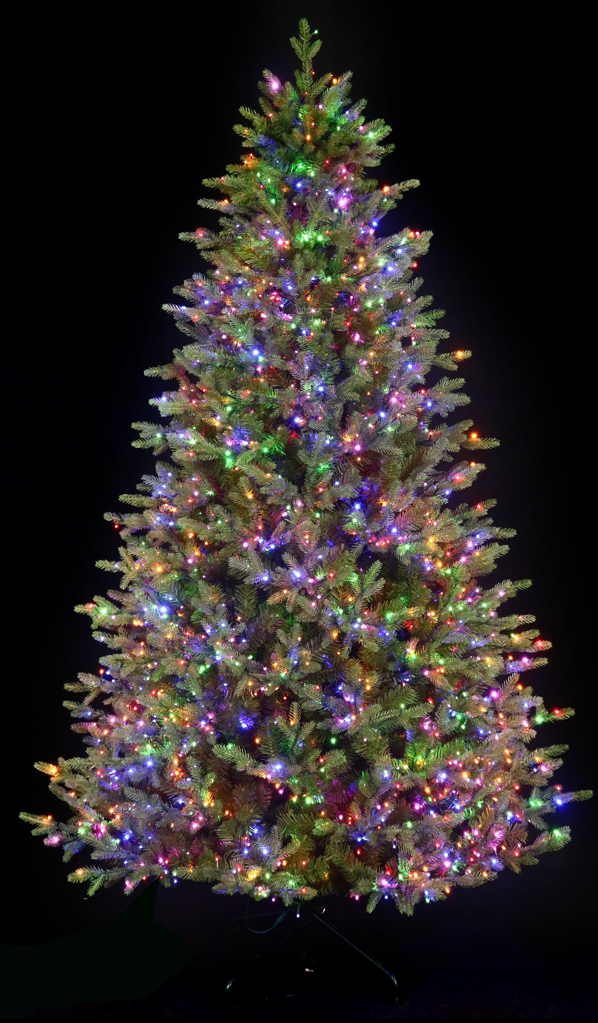 Artificial tree pre-lit with Color-Changing Starry LED lights.