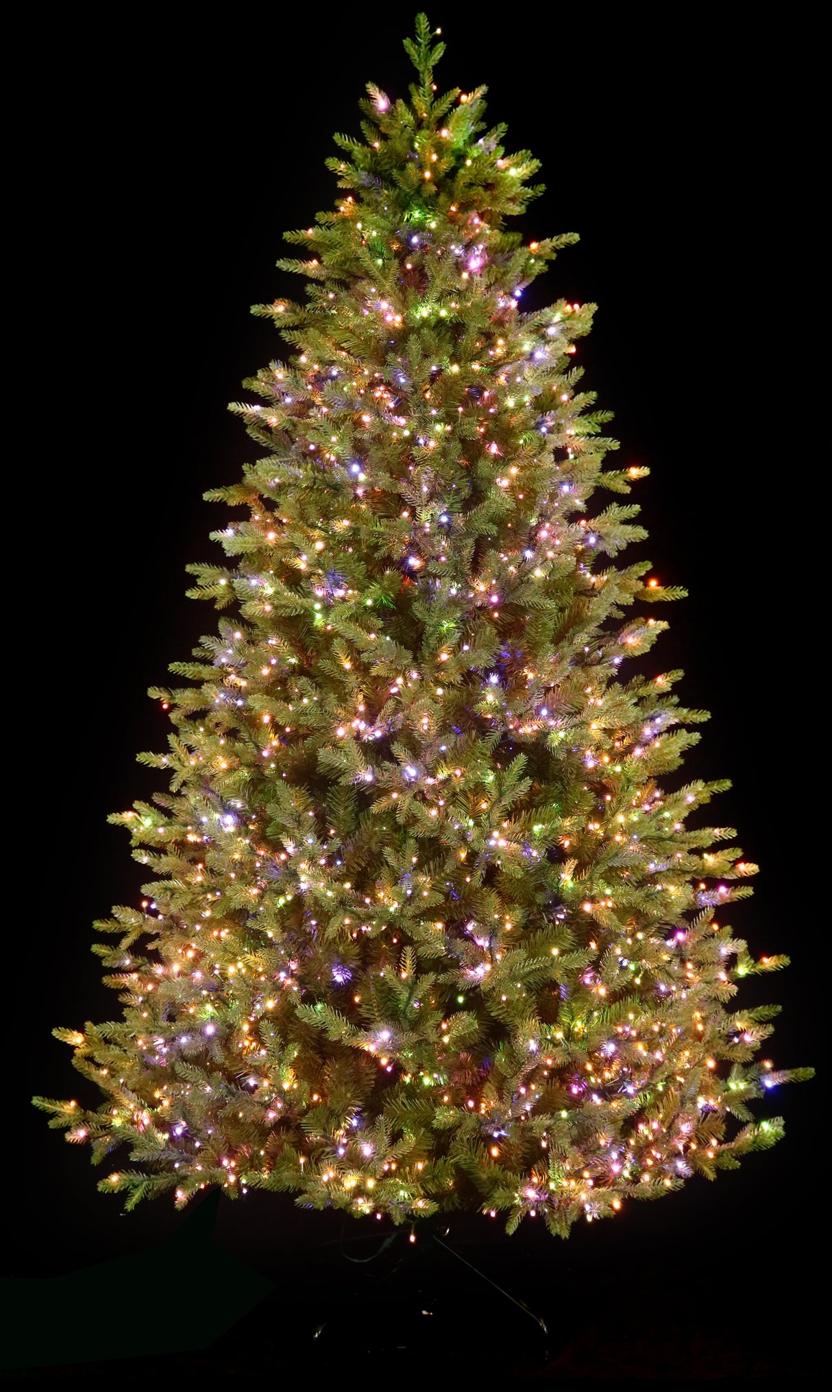 Artificial tree pre-lit with Color-Changing Starry LED lights.