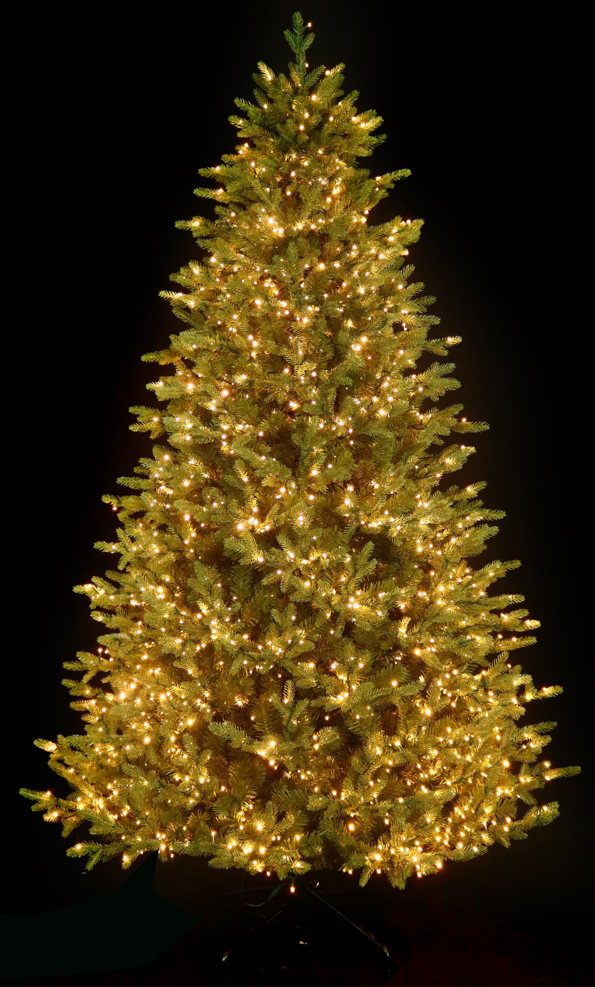 Artificial tree pre-lit with Color-Changing Starry LED lights.