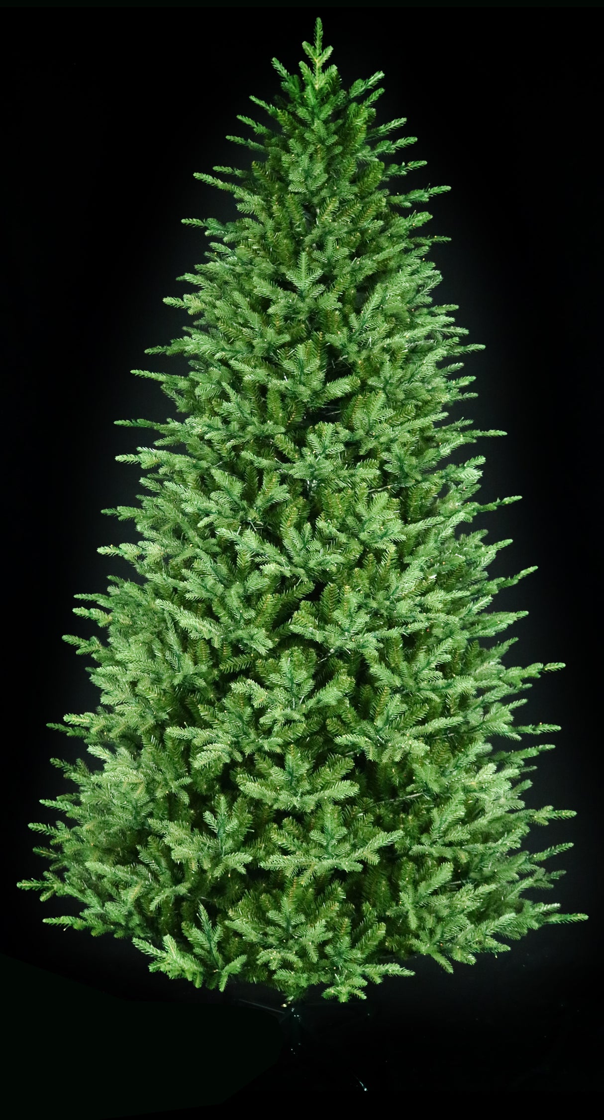 Artificial Christmas tree pre-lit with color-changing LED lights.