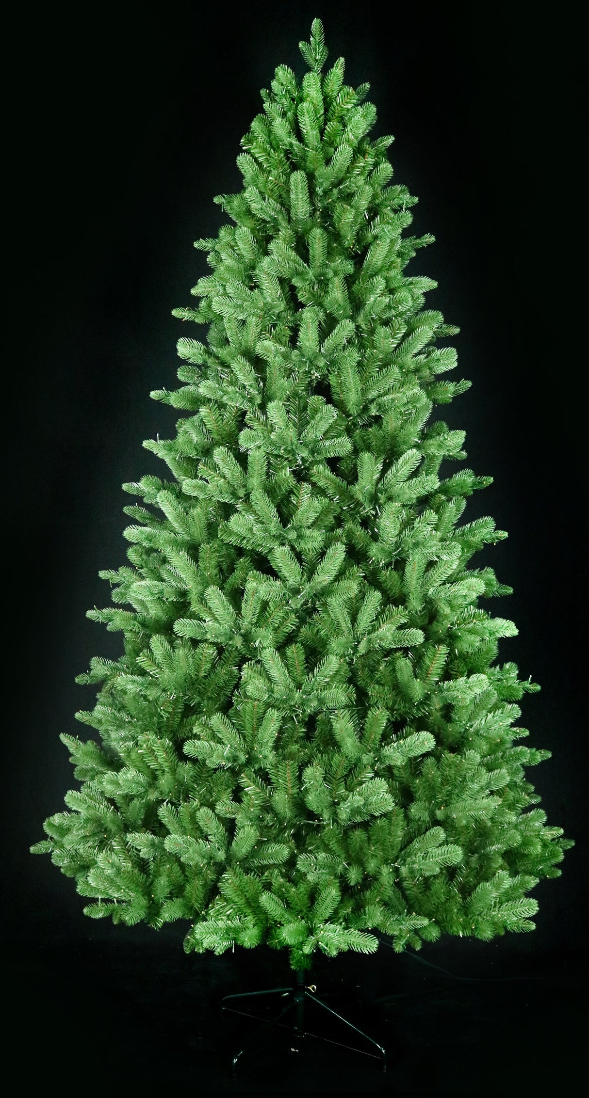 Artificial Christmas tree pre-lit with color-changing LED lights.