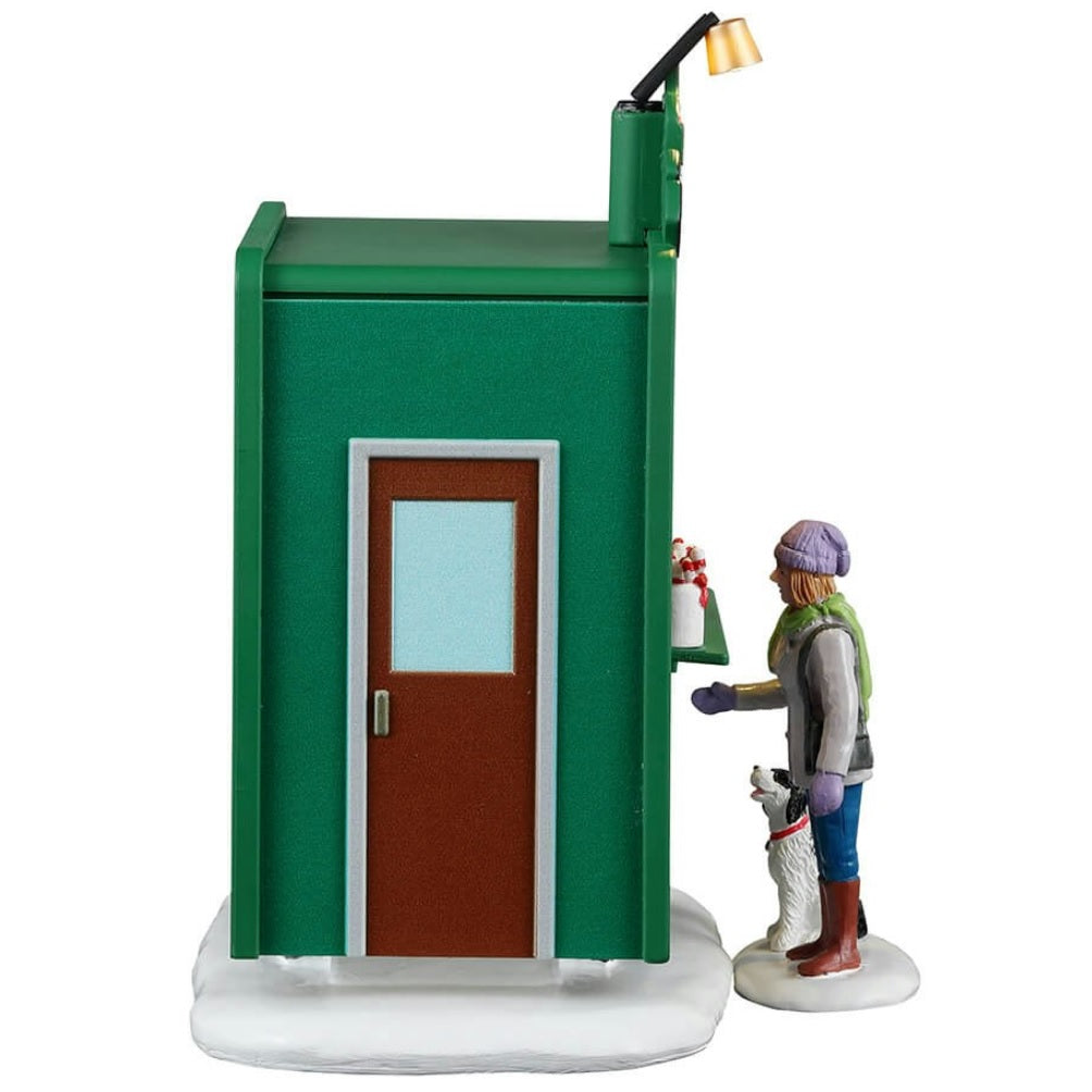 A sideview of a Lemax table accent for your Lemax Village display. It's the Cocoa Express #34149