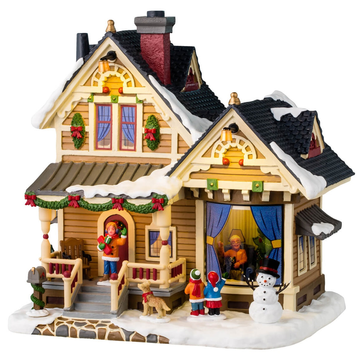 Resin lighted building for a Lemax display. Designed to look like a charming house covered in snow and decorated with wreaths and garlands. There are two children who just made a snowman and are now waving at Grandma in the window.