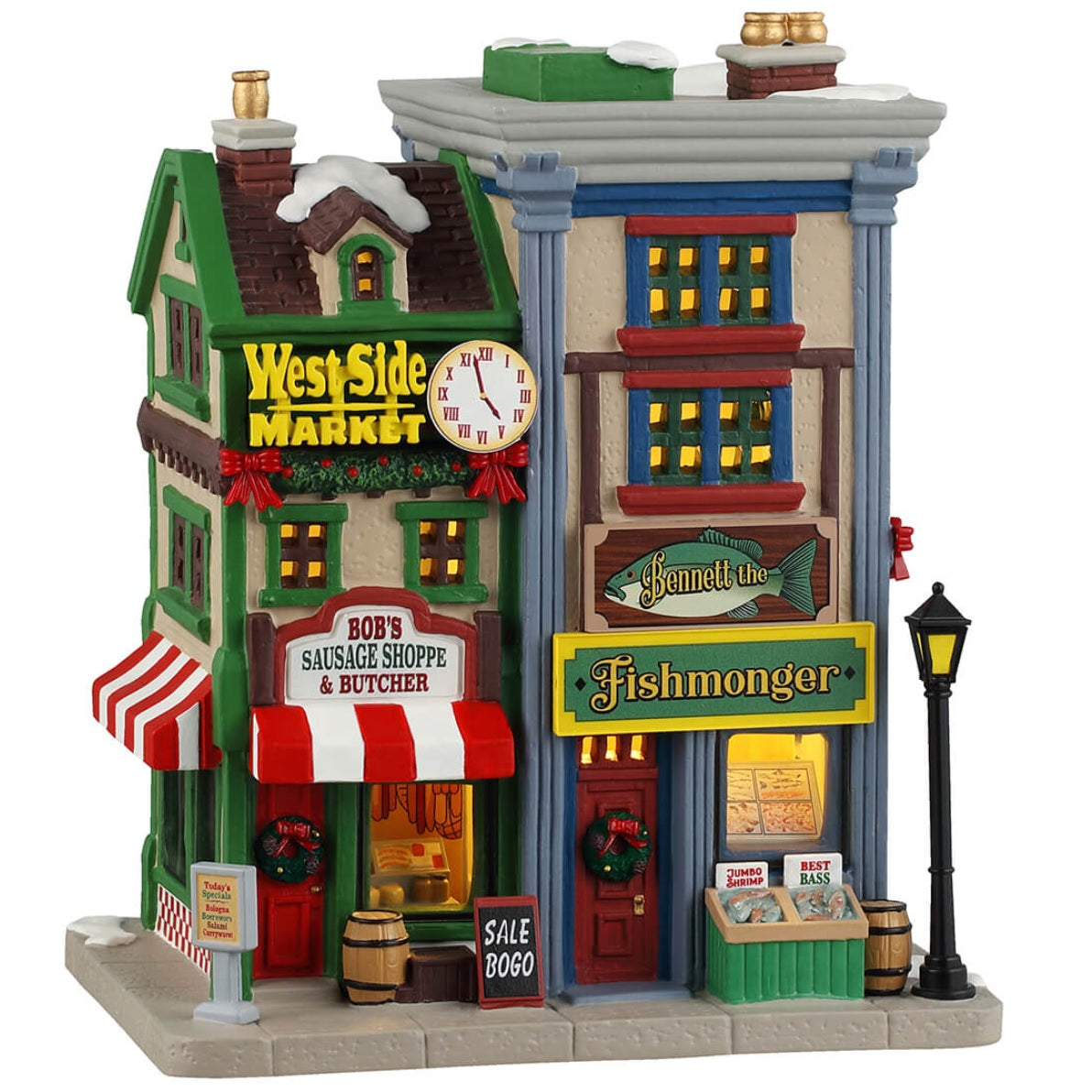 Porcelain lighted building for a Lemax display. Designed to look like two, colorful shops in the West Side Market. The shop on the left is Bob's Sausage Shoppe & Butcher. There's a wreath on the door and you can see the meat hanging inside. There's a sign on the ground that reads "SALE BOGO." The shop on the right is called Bennet the Fishmonger. You can see all the fish inside.