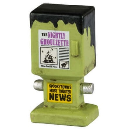 Resin village accents for a Lemax display. Designed to look like public newspaper boxes. One is orange and reads "Midnight Edition" and has a vulture sitting on top. The next one is black and shaped like a coffin. One is purple and a dark green and shaped like a birdhouse. The last one is shaped like Frankenstein's head.