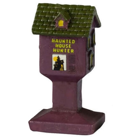 Resin village accents for a Lemax display. Designed to look like public newspaper boxes. One is orange and reads "Midnight Edition" and has a vulture sitting on top. The next one is black and shaped like a coffin. One is purple and a dark green and shaped like a birdhouse. The last one is shaped like Frankenstein's head.