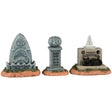 Resin village accents for a Lemax display. Designed to look like three tombstones. One is shaped like a shark and reads "Captain Jack 1957-1978." One is shaped like a pumpkin and reads "Ichabod Crane 1730-1789. Lost his head." The other is shaped like a Ouija board with a witch hat on top and has a black cat sitting on it.