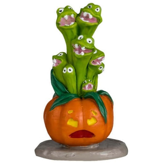 Resin table accents for a Lemax display. Designed to look like five really weird, alive plants. One looks like a bunch of green snakes coming out of a pumpkin. One is purple flowers with eyes and blue flowers in a black pot with blood coming out of it. One is red flowers with eyes and the pot reads "Do Not Touch." One is a Venus fly trap and the pot reads "Beware." The other is a purple Venus fly trap and the pot reads "Keep Back 10 feet."