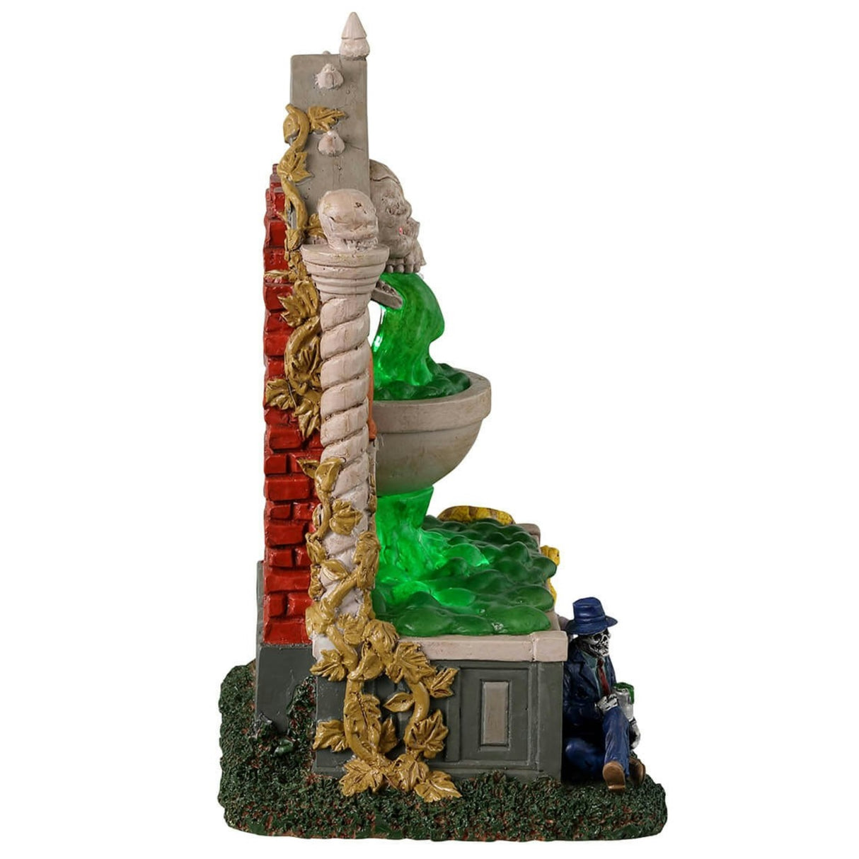 Resin village accent for a Lemax Spooky Town display. Designed to look like a well. The spout where the water is coming from is a skull with red eyes and bat wings. There are snakes and salamanders and a small skeleton man wearing a suit sitting at the bottom. The water is actually a bright green color.