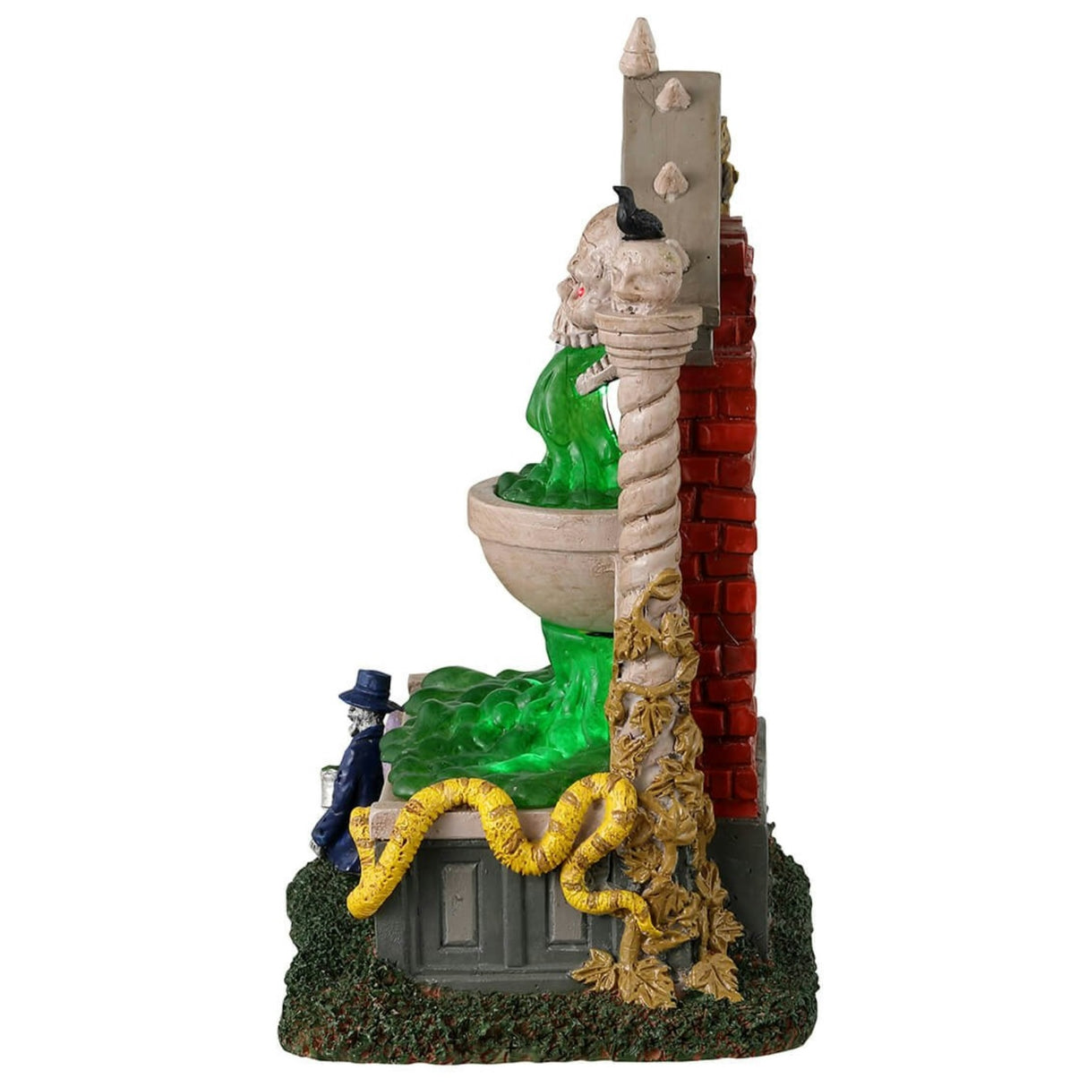 Resin village accent for a Lemax Spooky Town display. Designed to look like a well. The spout where the water is coming from is a skull with red eyes and bat wings. There are snakes and salamanders and a small skeleton man wearing a suit sitting at the bottom. The water is actually a bright green color.
