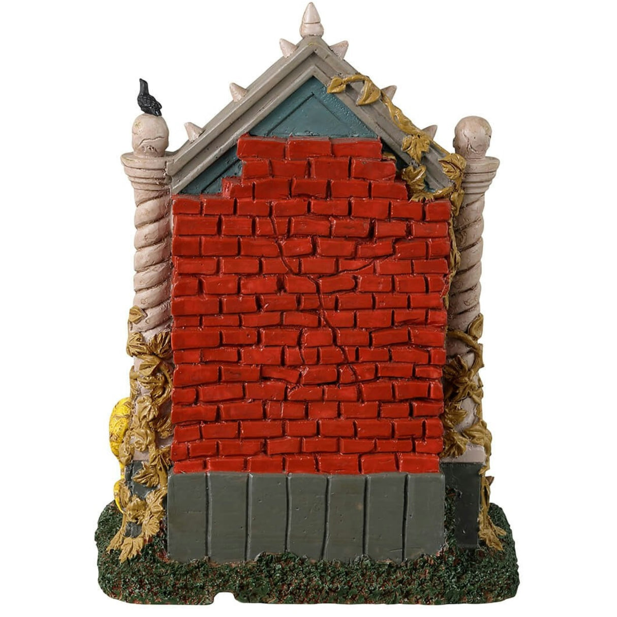 Resin village accent for a Lemax Spooky Town display. Designed to look like a well. The spout where the water is coming from is a skull with red eyes and bat wings. There are snakes and salamanders and a small skeleton man wearing a suit sitting at the bottom. The water is actually a bright green color.