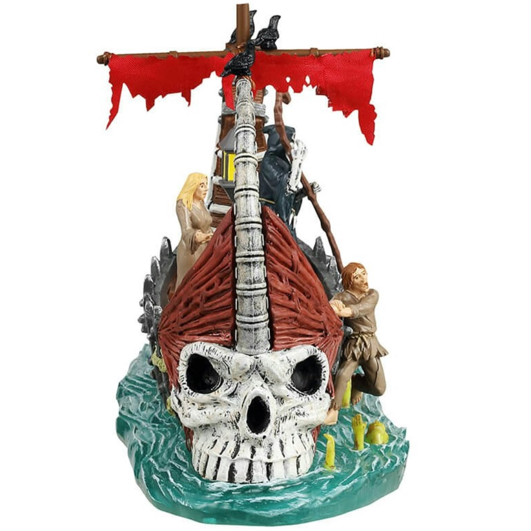 Resin table accent for a Lemax display. Designed to look like a very spooky Viking ship being driven by the Grim Reaper. There are crows and a tattered red sail. There are two people surprised to see the monster in the water. There's a pot of gold on board. The front of the ship looks like a skull.