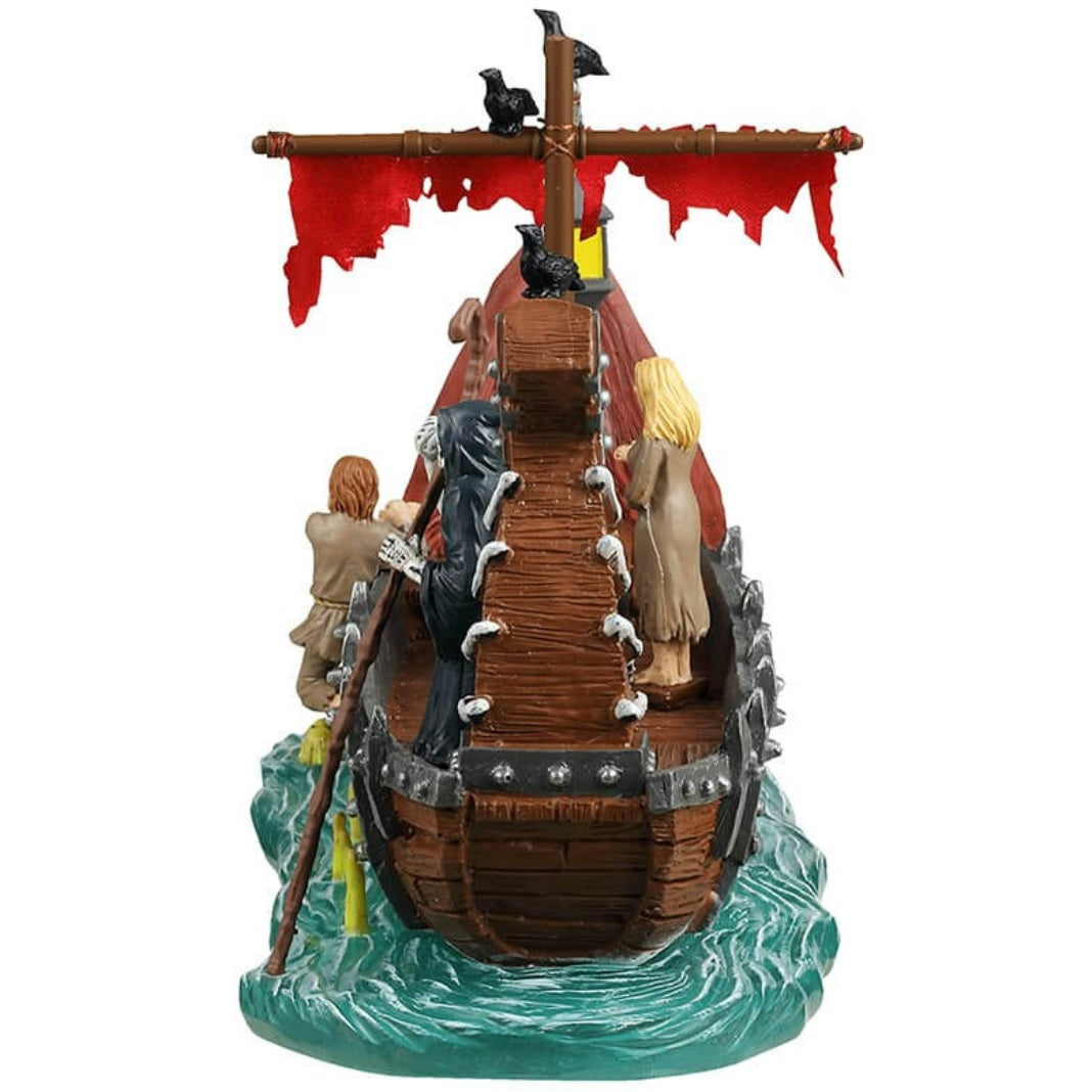 Resin table accent for a Lemax display. Designed to look like a very spooky Viking ship being driven by the Grim Reaper. There are crows and a tattered red sail. There are two people surprised to see the monster in the water. There's a pot of gold on board. The front of the ship looks like a skull.