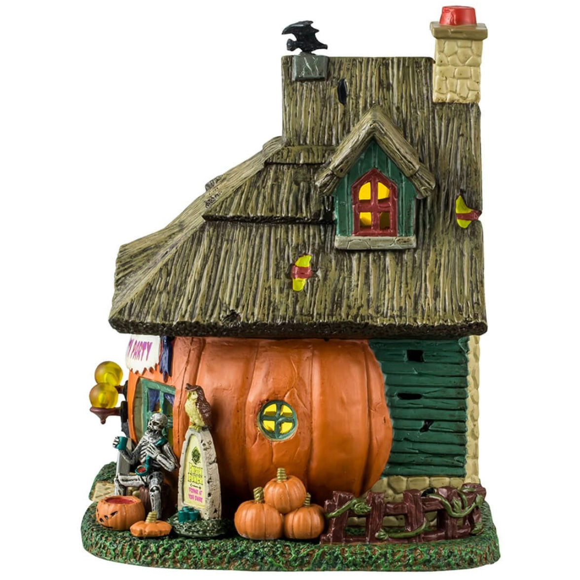 Porcelain lighted building for a Lemax display. Designed to look like a cabin made out of a pumpkin. There's a skeleton sitting in front of the house and a black cat and jack-o-lantern accents. There's a sign above the front door that reads "PUMPKIN PATCH PARTY."
