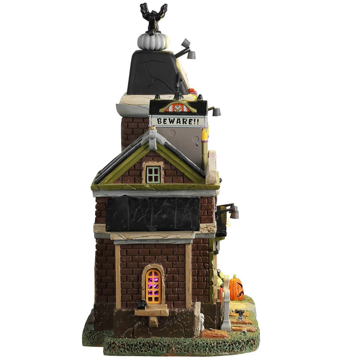 Resin lighted building for a Lemax display. Designed to look like a spooky mansion turned into a telephone company. There are tombstones and jack-o-lanterns in front and ghosts near the roof. It's a little rundown and there are purple lighted accents.